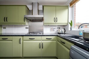 Fridge, oven, coffee/tea maker, toaster