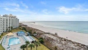 A resort with a swimming pool, beach access, and a pier. - Moonspinner by Book That Condo (Panama City Beach)