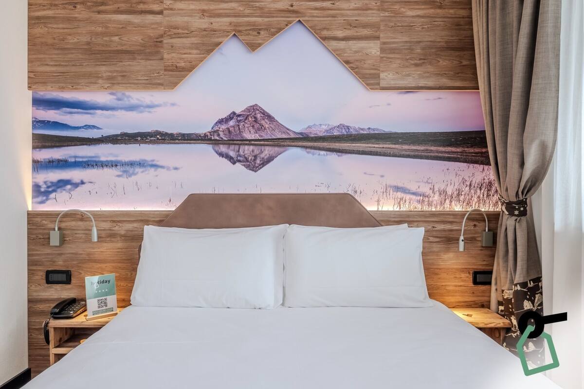 Caja fuerte, escritorio, wifi gratis y ropa de cama