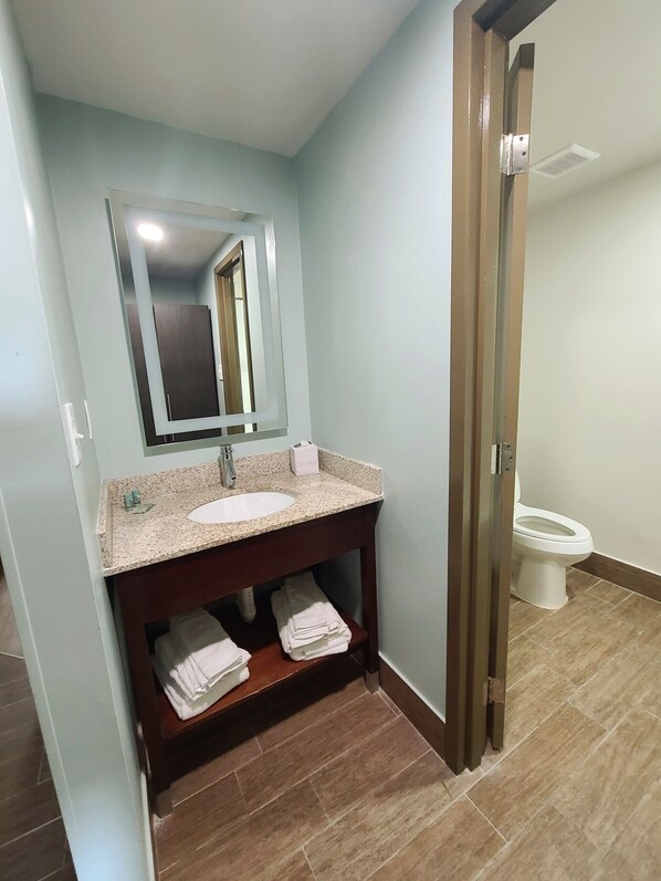 Hair dryer, towels, soap, shampoo
