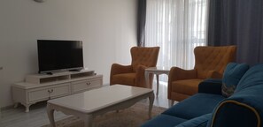 Appartamento familiare | Area soggiorno | TV LED 104 pollici con canali satellitari, docking station per iPod