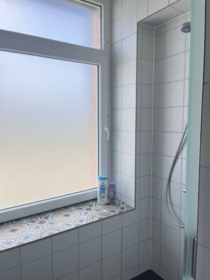 Shower, towels, soap, shampoo