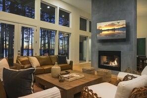 Smart TV, fireplace, books, offices