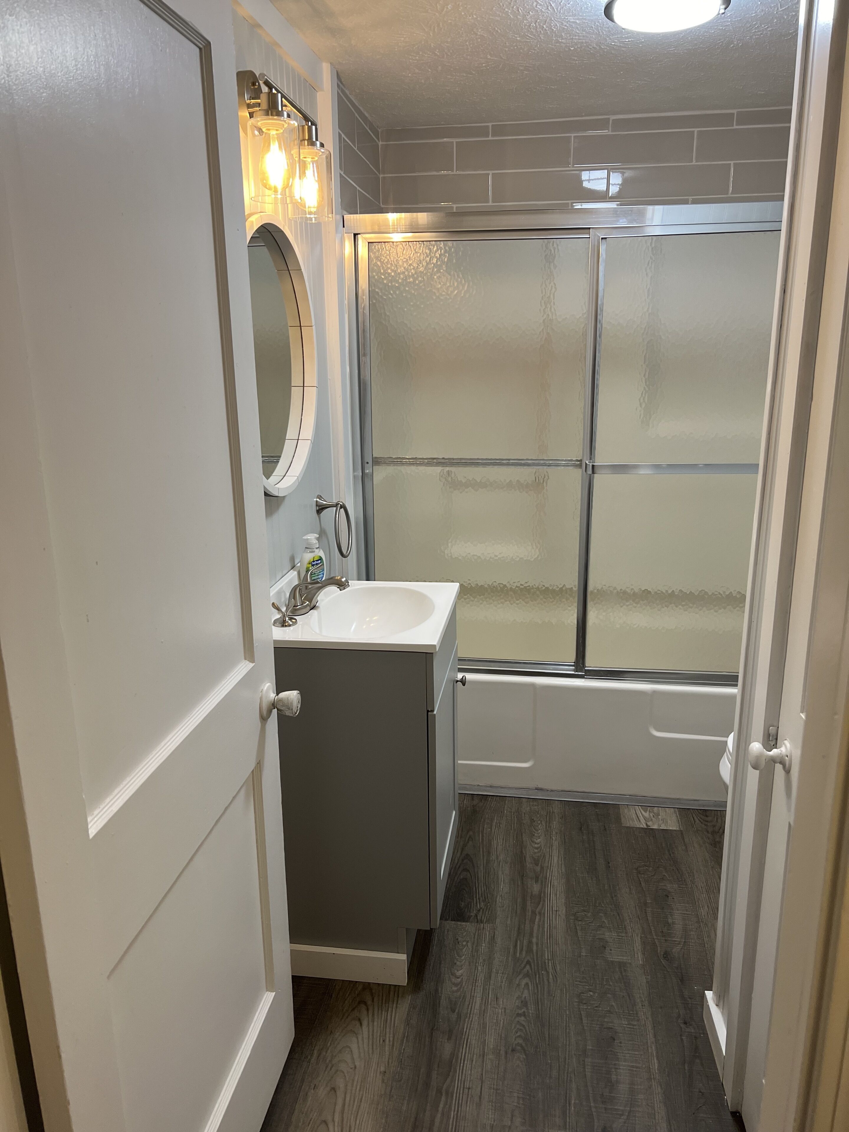 Shower, towels, toilet paper
