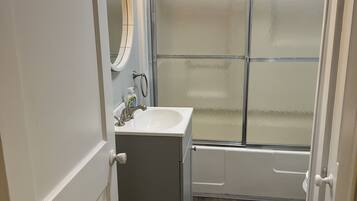 Shower, towels, toilet paper