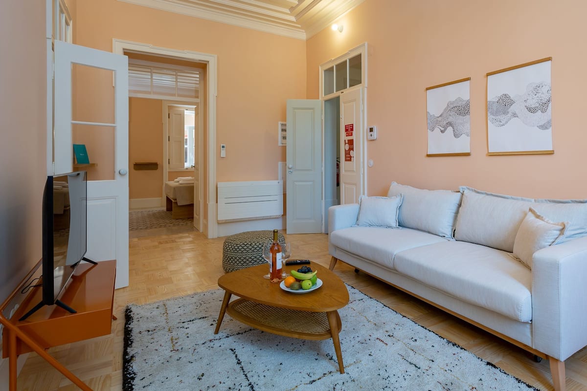 Standard Apartment | Living area | 40-inch flat-screen TV with cable channels