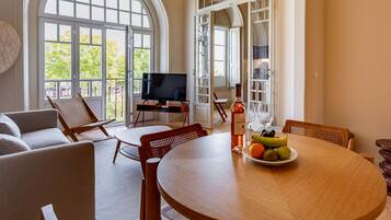 Family Apartment | Living area | 40-inch flat-screen TV with cable channels