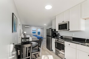 奢華開放式套房, 2 張加大雙人床, 海景, 海濱 | 埃及棉床單、高級寢具、布置獨特、筆電工作空間