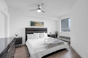 1 bedroom, desk, iron/ironing board, travel crib