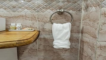 Hair dryer, towels, soap, shampoo