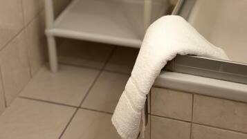 Standard Single Room | Bathroom | Shower, hair dryer, towels, soap