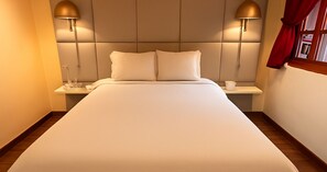 Habitación doble | Ropa de cama de alta calidad y edredones de plumas