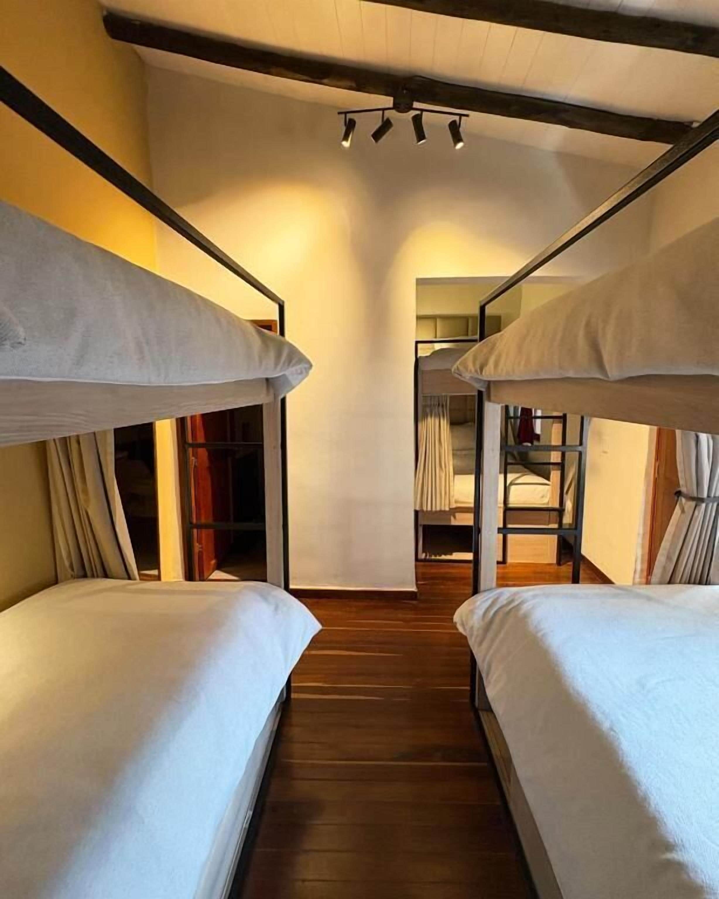 Premium bedding, down comforters, soundproofing, free WiFi