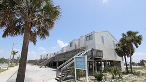 A coastal building with a sign reading "South Winds 110 W. 2nd St." - Southwinds (Gulf Shores)