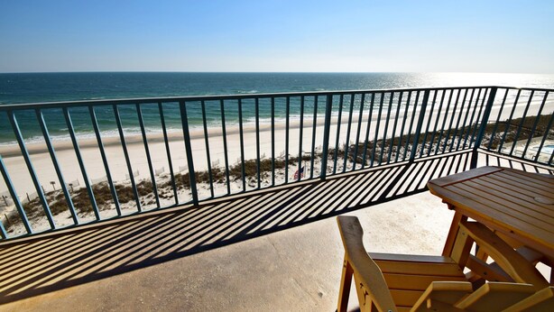 A balcony with a view of the beach and ocean. - Surf Side Shores (Gulf Shores)