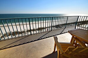 A balcony with a view of the beach and ocean. - Surf Side Shores (Gulf Shores)
