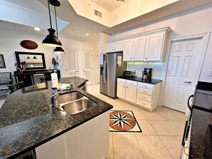 Condo, Multiple Beds, Pool Access, Pool View (The Moorings 107) | Private kitchen | Coffee/tea maker