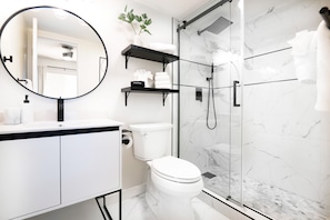 Shower, eco-friendly toiletries, hair dryer, towels