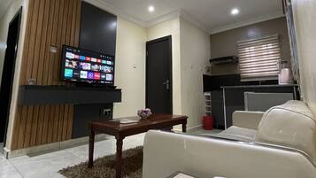 Quarto empresarial | Área de estar
