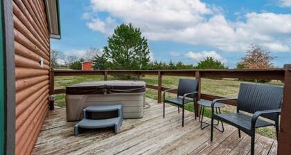 Cozy cabin retreat with private hot tub and breakfast