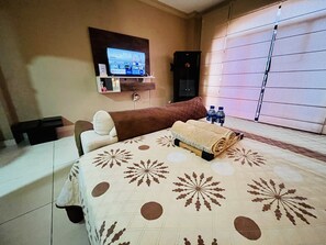 Casa junior, 1 cama Queen size | 1 habitación, escritorio, wifi gratis y ropa de cama 