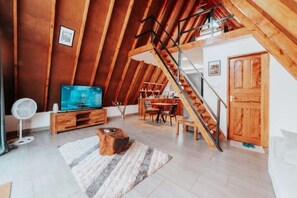 Living area - A Frame Tiny Cabin with pool. (Moshi Urban)