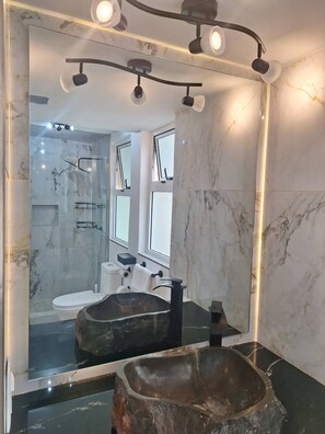 Shower, hair dryer, towels, soap