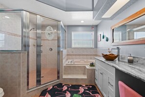 Shower, jetted tub, hair dryer, towels