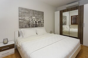 2 habitaciones, tabla de planchar con plancha, wifi y ropa de cama 