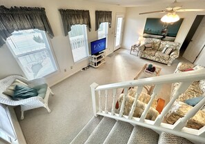 Living area - Second Row Gem with Ocean Views, Private Deck, Jacuzzi and Room to Relax (Holden Beach)