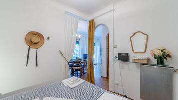 2 dormitorios, tabla de planchar con plancha, wifi y ropa de cama
