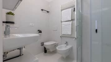 Regadera, secadora de cabello, bidet