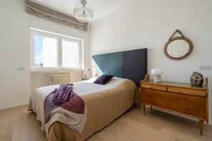 2 dormitorios, tabla de planchar con plancha, wifi y ropa de cama