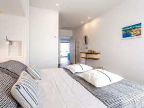 2 quartos, berço de viagem, Wi-Fi de cortesia, roupa de cama
