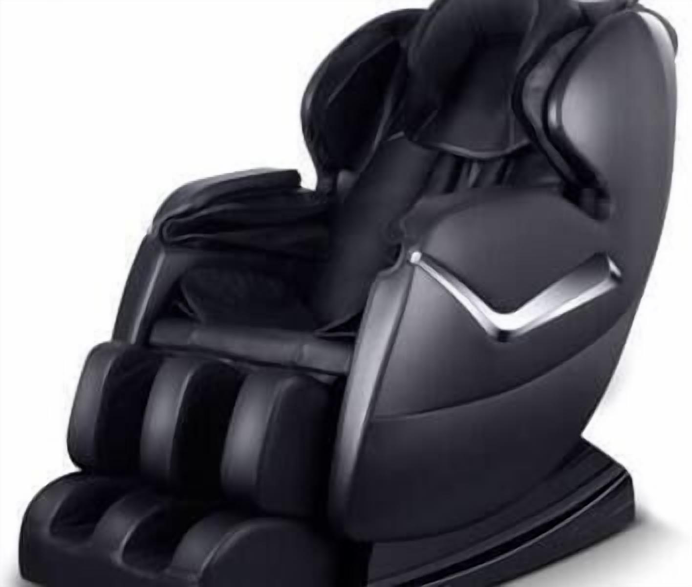 A massage chair with a sleek black design and a metallic accent.