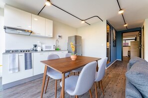 Fridge, microwave, stovetop, coffee/tea maker
