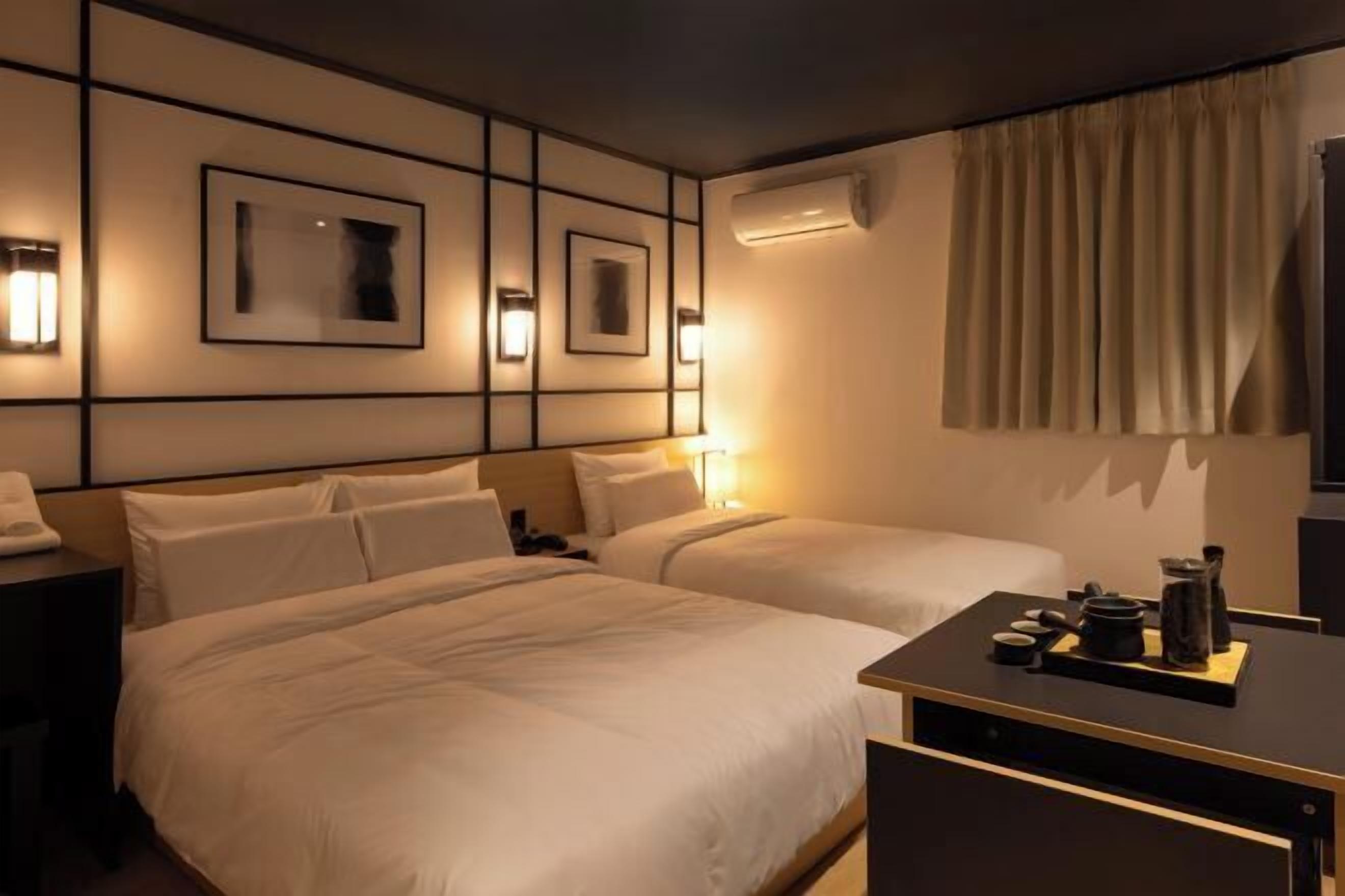 Premium bedding, desk, laptop workspace, free WiFi