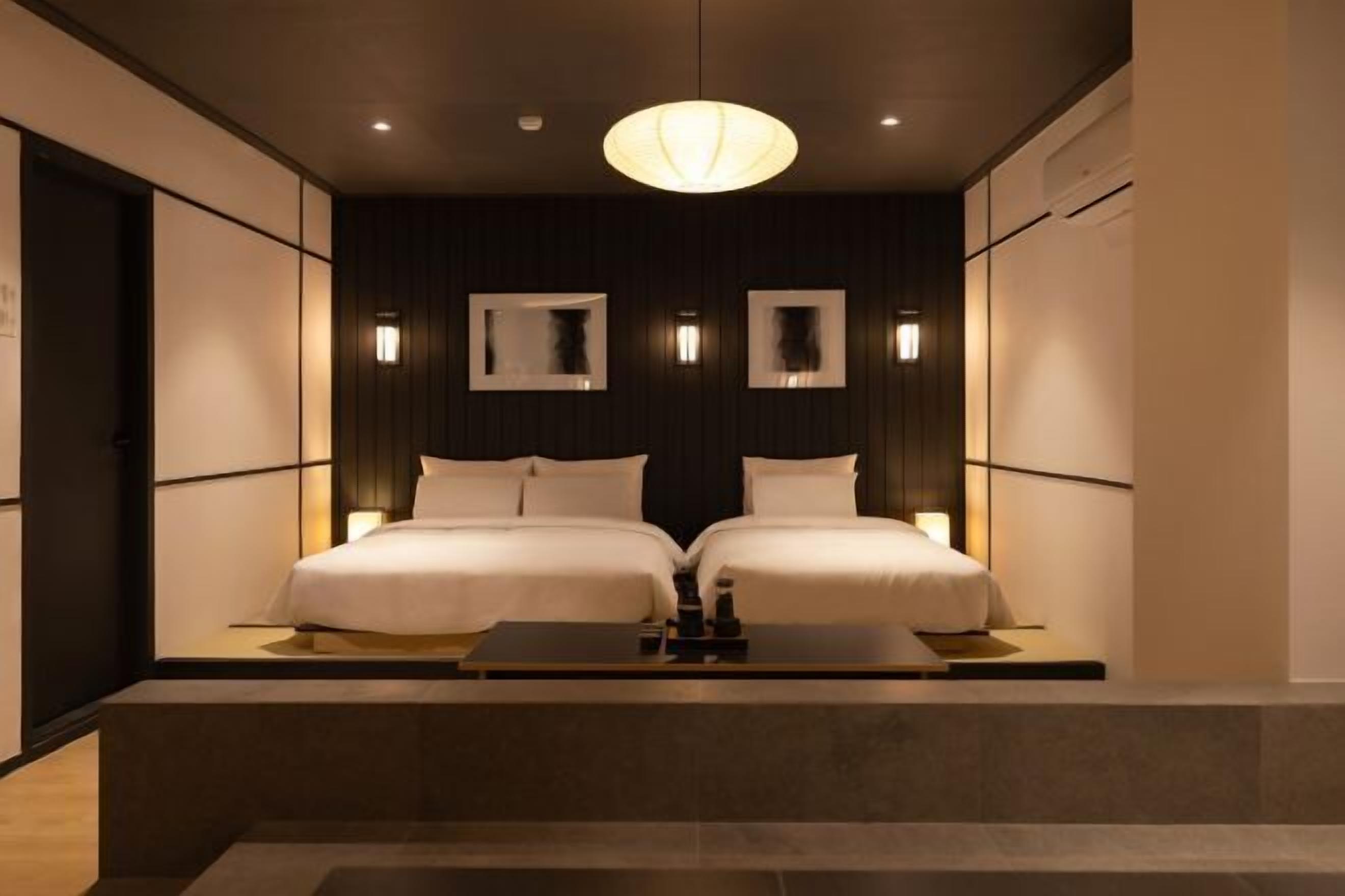 Premium bedding, desk, laptop workspace, free WiFi