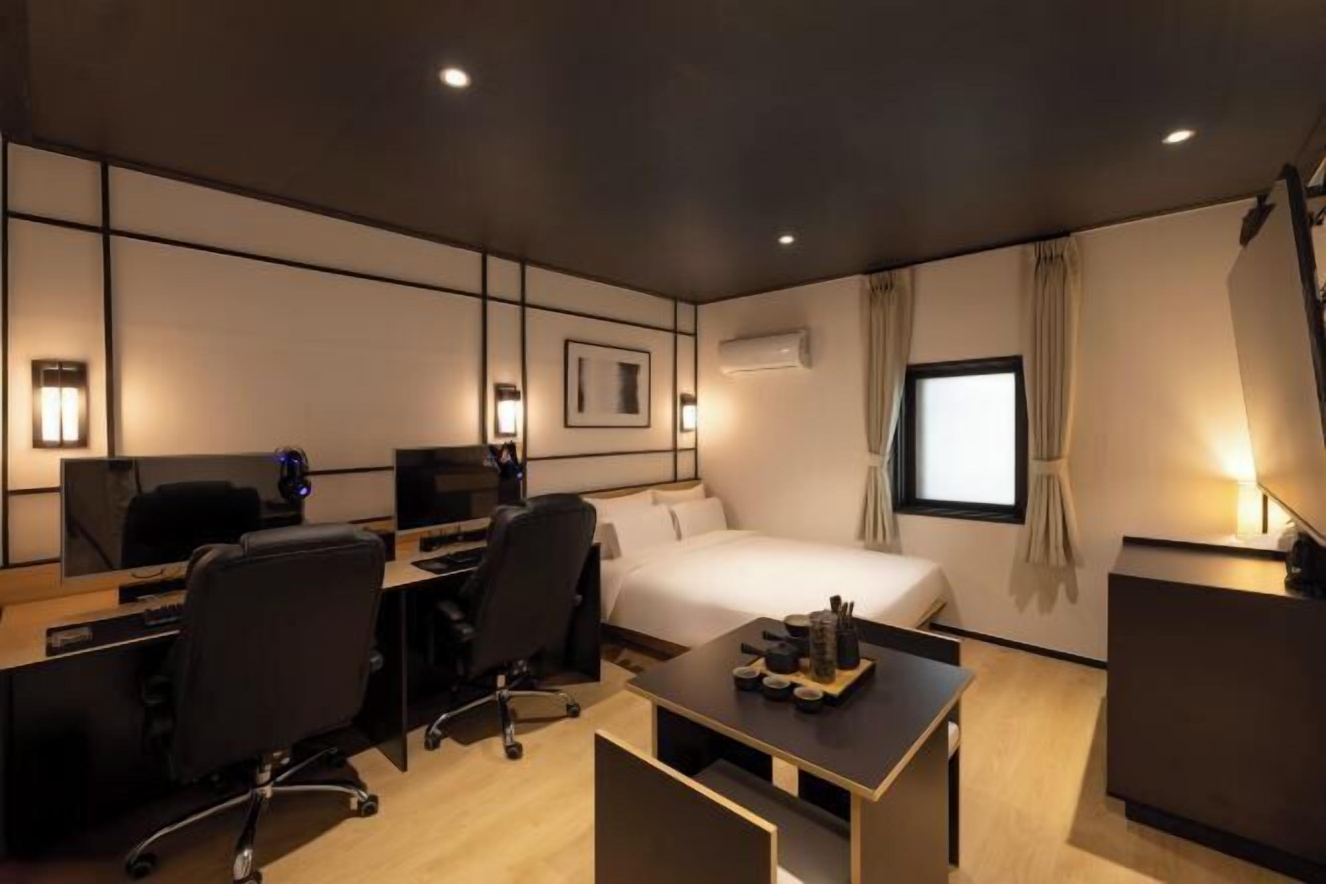 Premium bedding, desk, laptop workspace, free WiFi