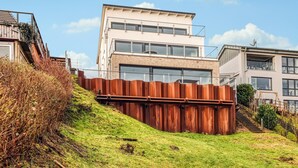 A modern two-story building with large windows and a flat roof. - 2 bedroom nice apartment in Eckernförde (Eckernförde)