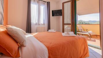 1 slaapkamer, een strijkplank/strijkijzer, wifi, beddengoed