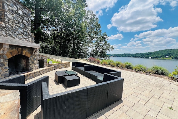 Outdoor Fireplace with cushioned seating