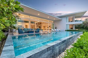 Outdoor pool, pool umbrellas, pool loungers