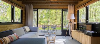 Elegant wooden house on the edge of the forest