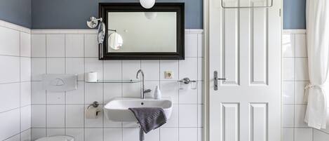 Shower, free toiletries, hair dryer, towels