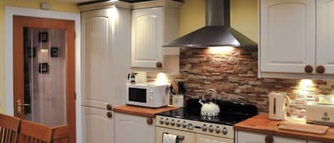 Oven, dishwasher, highchair, dining tables