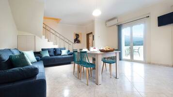 Departamento, 2 habitaciones, balcón, vista al jardín | Restaurantes