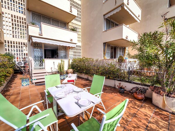 Enjoy dining al fresco amidst lush greenery and a serene garden setting.