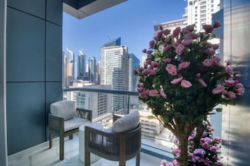 Balcony Oasis: Sip coffee while soaking in stunning skyline views in style!