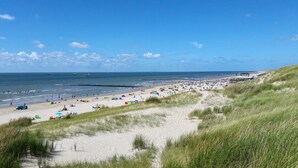 A beach with sand, dunes, and the sea. - 3 bedroom accommodation in Julianadorp aan Zee (Julianadorp aan Zee)